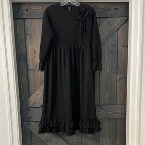 Girls' Black Long Sleeve Ruffled Dress with Flower Detail